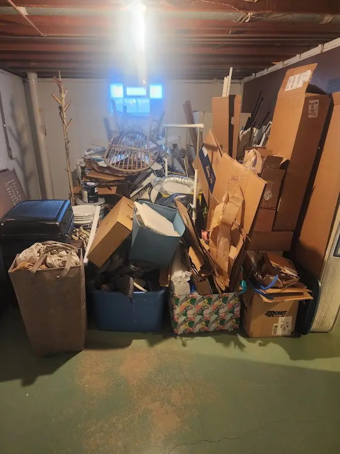 Roll-off dumpster container at job site for Concrete Dumpster Rental in Grand Blanc